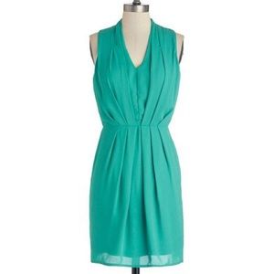 Green pleated dress